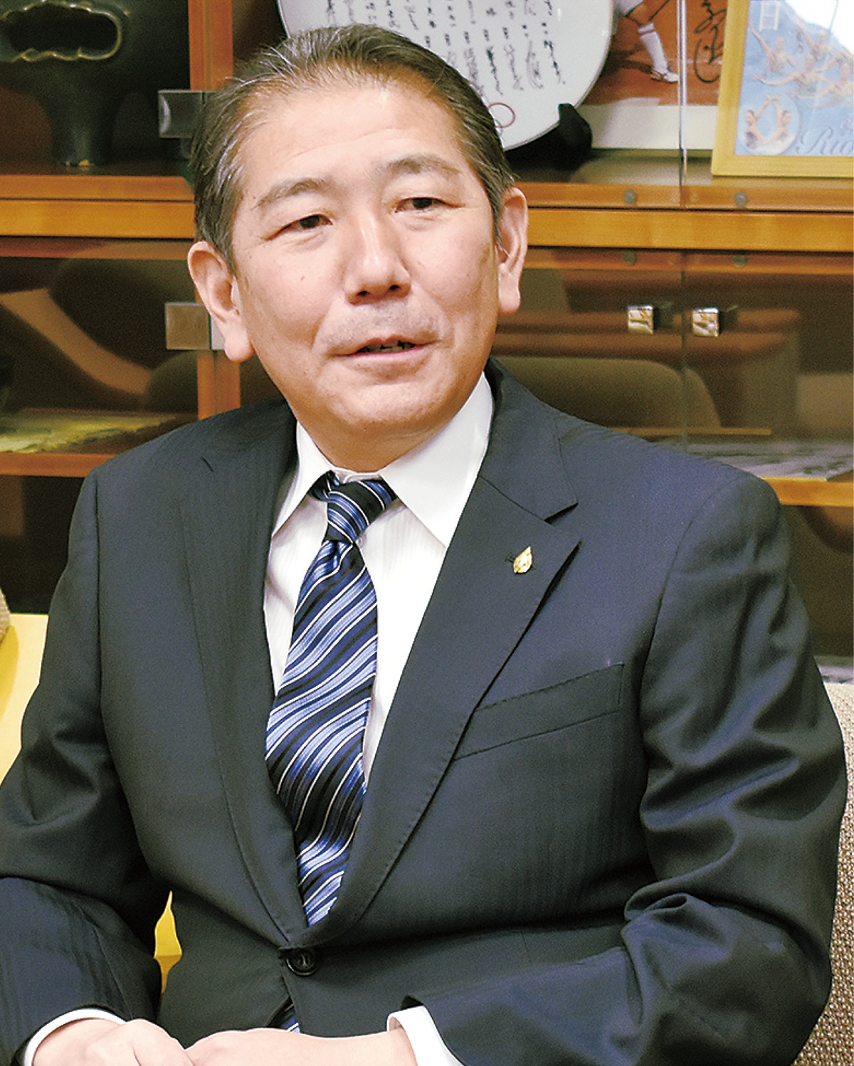 質問に答える佐藤光市長＝昨年12月７日、市役所