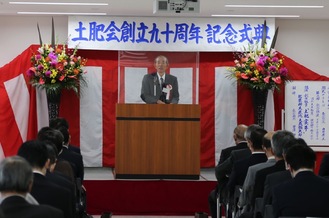 The chairman speaking at the ceremony