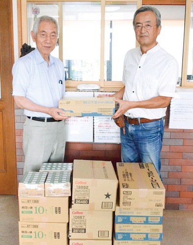 志村理事長(左)と滝本理事長代理