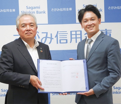 佐藤常務理事（左）と黒田代表