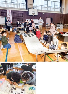 昨年末に東小学校で開催されたソープボックスカーのミニチュア「モックカー」を使っての体験授業の様子。体育館に設えられた特設コースでのレース風景とモックカーキットを使っての製作の様子