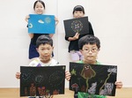 奥：杉崎湖音さん(左･６年)／多田出奈央さん(右･４年)手前：今井克紀さん(左･２年)／駿太さん(右･２年)