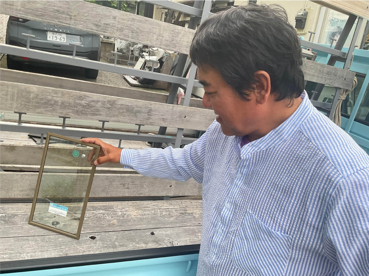 窓ガラスの遮熱性について語る矢崎専務